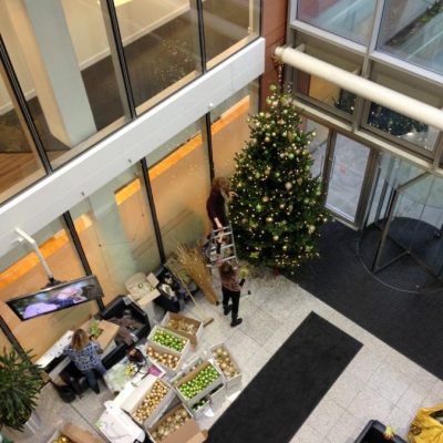 Corporate Christmas Tree - Being decorated by Flowers By Flourish